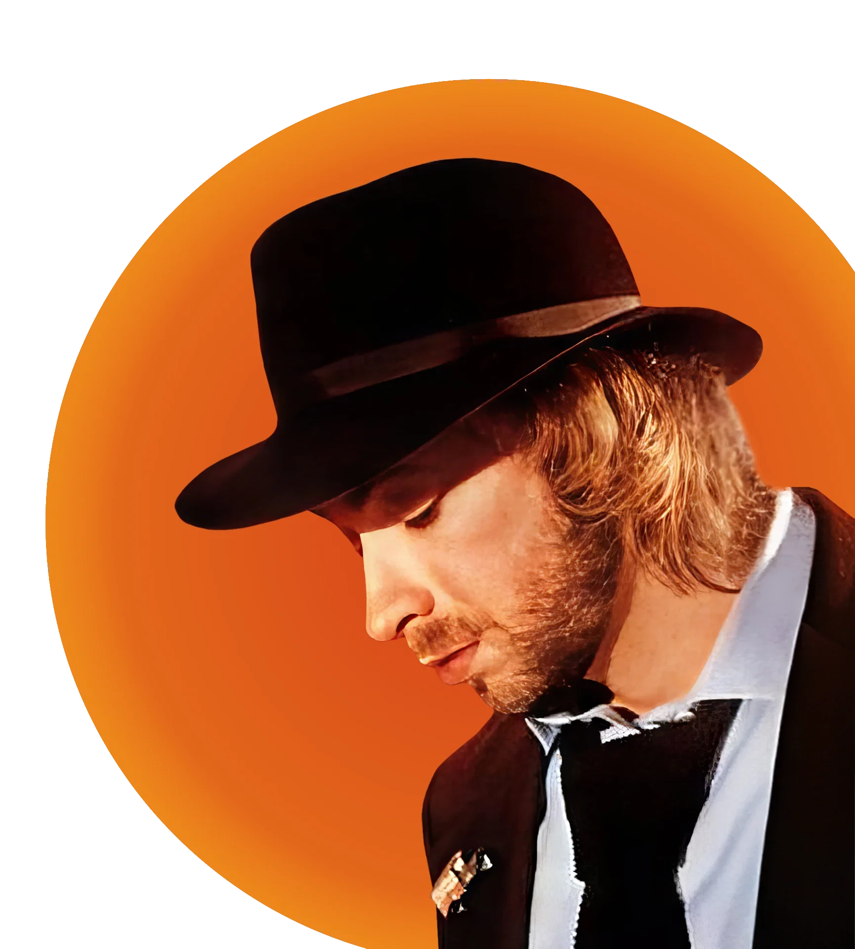 Bobby Caldwell in a black fedora against an orange sun